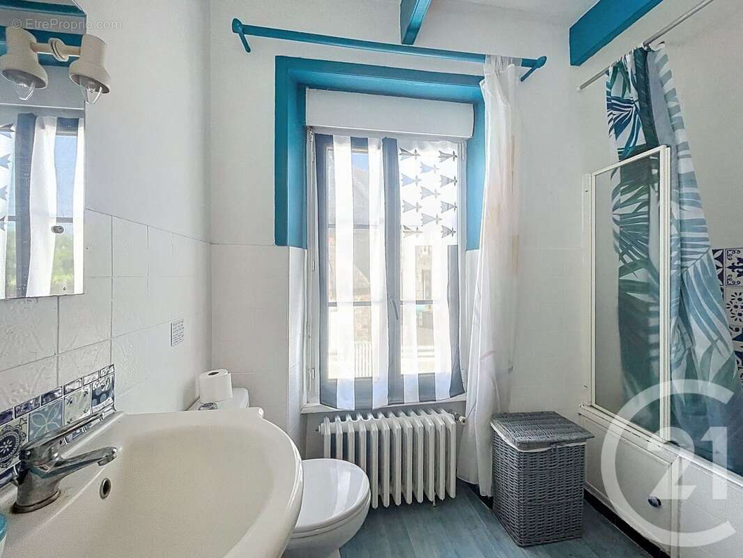 Maison 106 m² à Belle-Isle-En-Terre  - photo 9