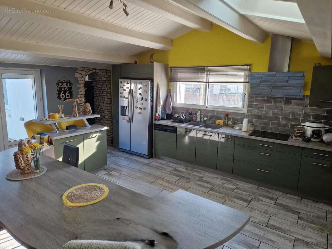 Maison 110 m² à Vouille-Les-Marais  - photo 2