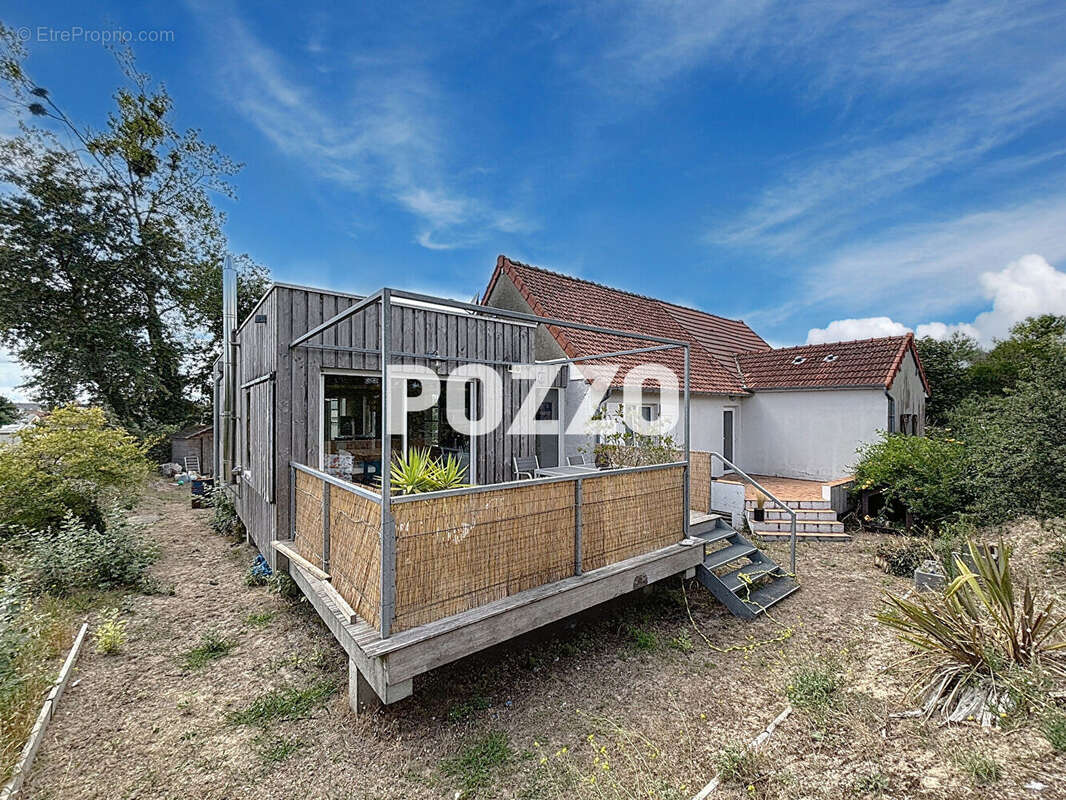 Maison à AGON-COUTAINVILLE