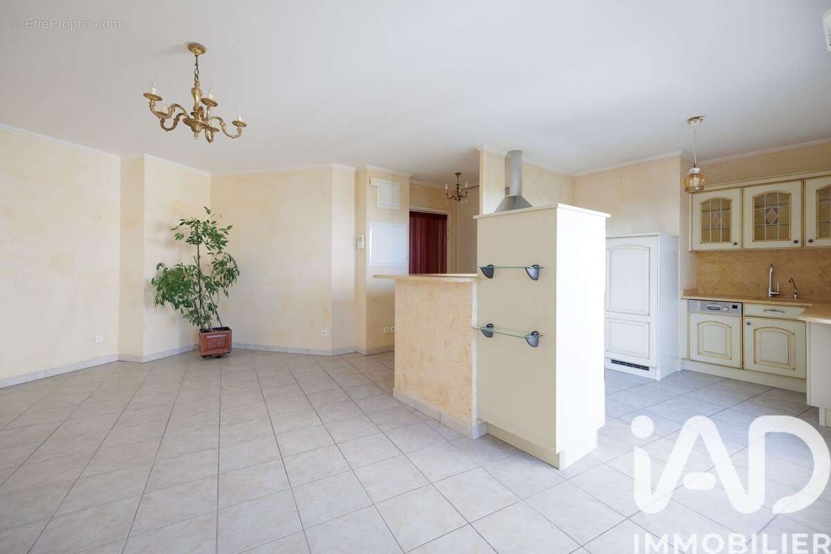 Photo 4 - Appartement à SAINT-GENIS-LES-OLLIERES