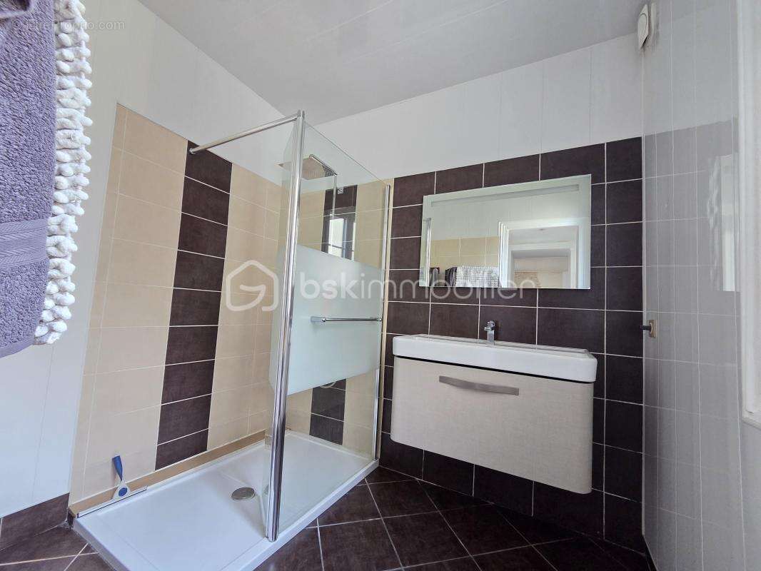 Magnifique appartement T3 de 101m² avec place de parking privative et cave en hypercentre ville de Nevers - photo 11