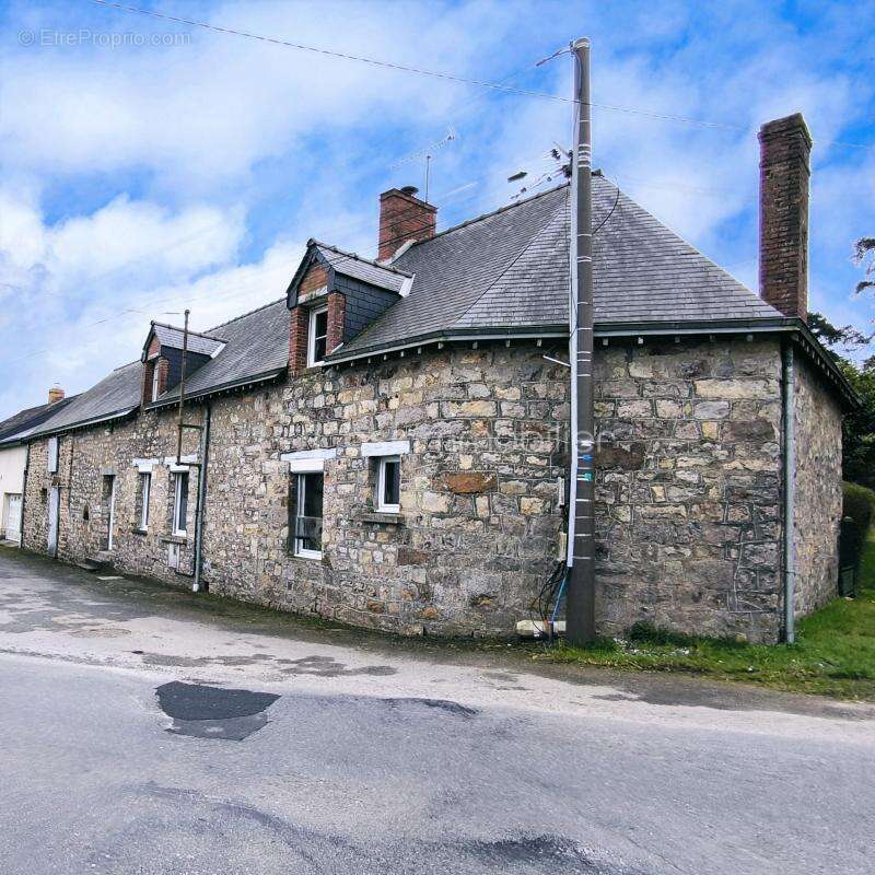 Maison à JUVIGNE