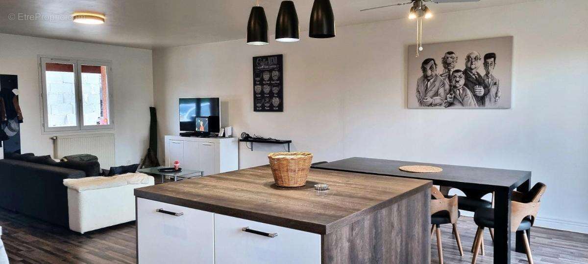 Maison 135 m² à Neuville-Les-Dames  - photo 6