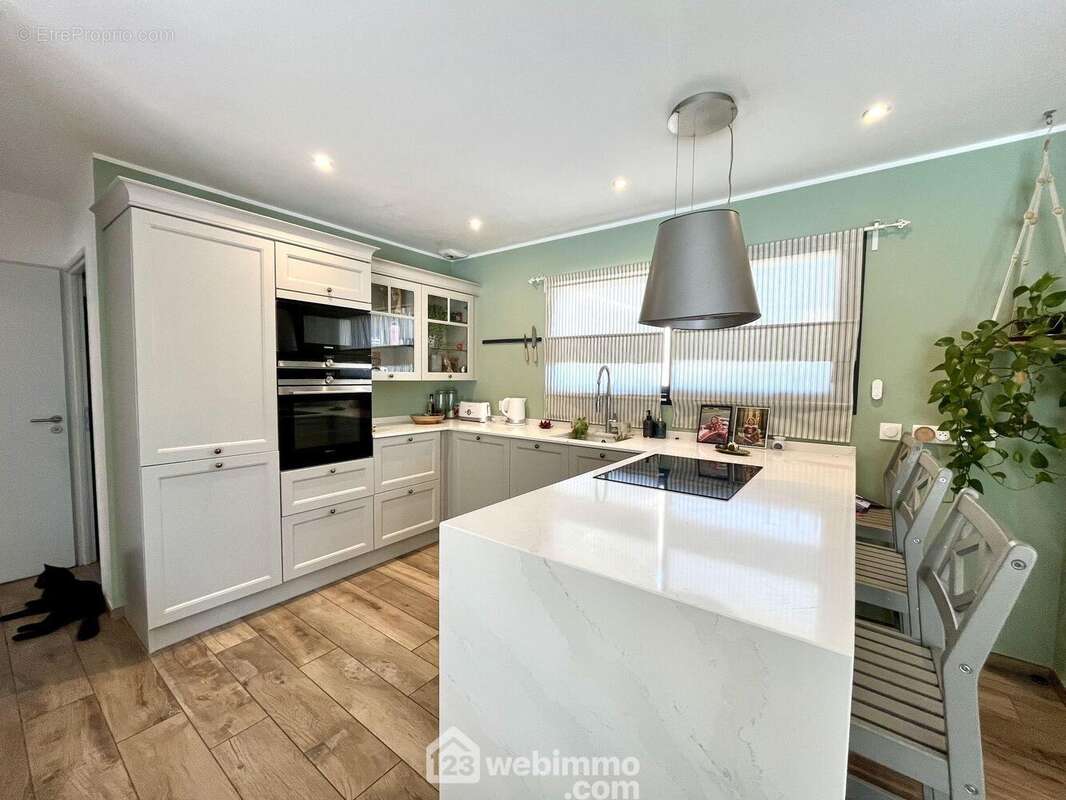 Maison 124 m² à Sainte-Helene  - photo 7