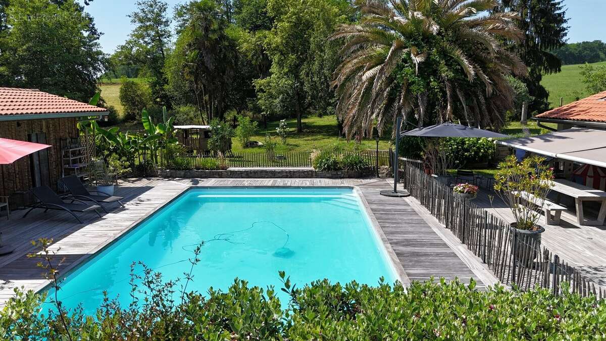 Exceptionnelle ferme landaise rénovée  parc de 6 000 m²  piscine  dépendance  prestations haut de gamme - photo 24