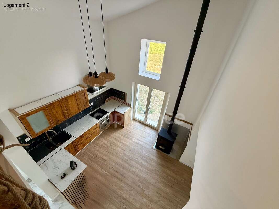 Maison avec deux logements indépendants : une opportunité rare pour habiter, investir ou réunir plusieurs générations - photo 12