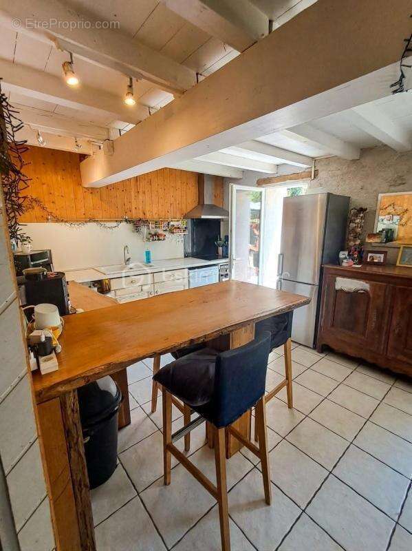 Charme et Authenticité : Maison en pierre restaurée (100m²) - photo 6