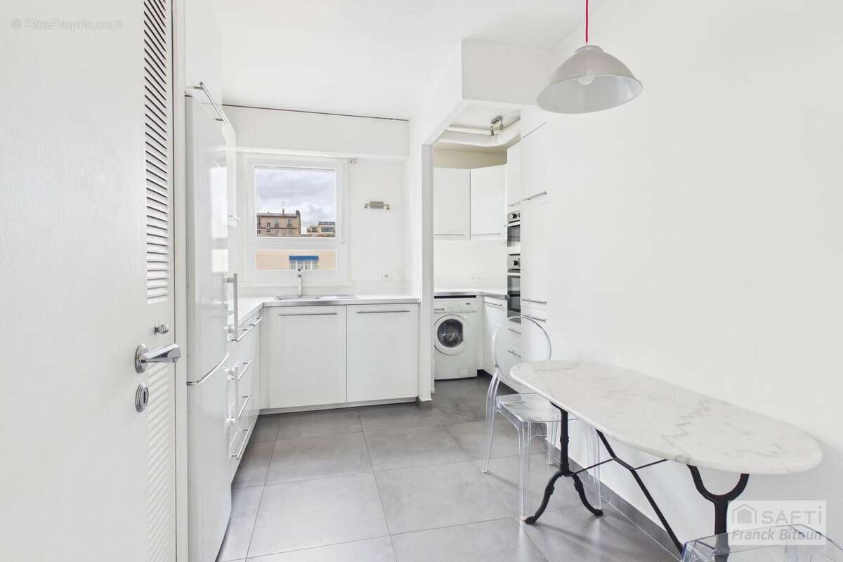 Photo 9 - Appartement à COURBEVOIE