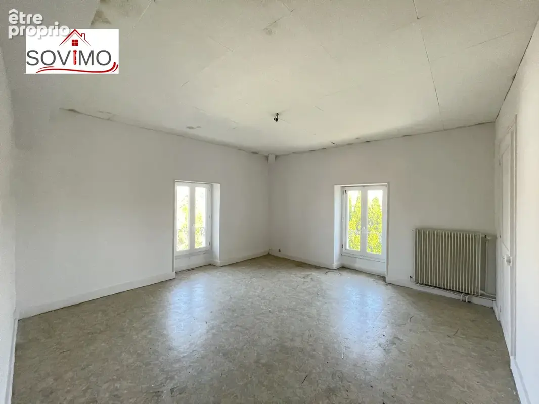 Maison de ville à rénover : jardin, garage et beau potentiel - photo 11