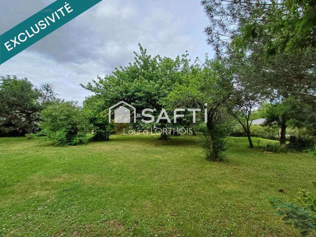 Photo 2 - Terrain à DREMIL-LAFAGE