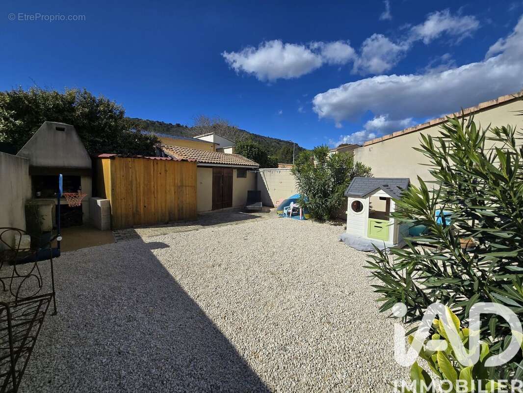 Photo 3 - Maison à LAUDUN-L'ARDOISE