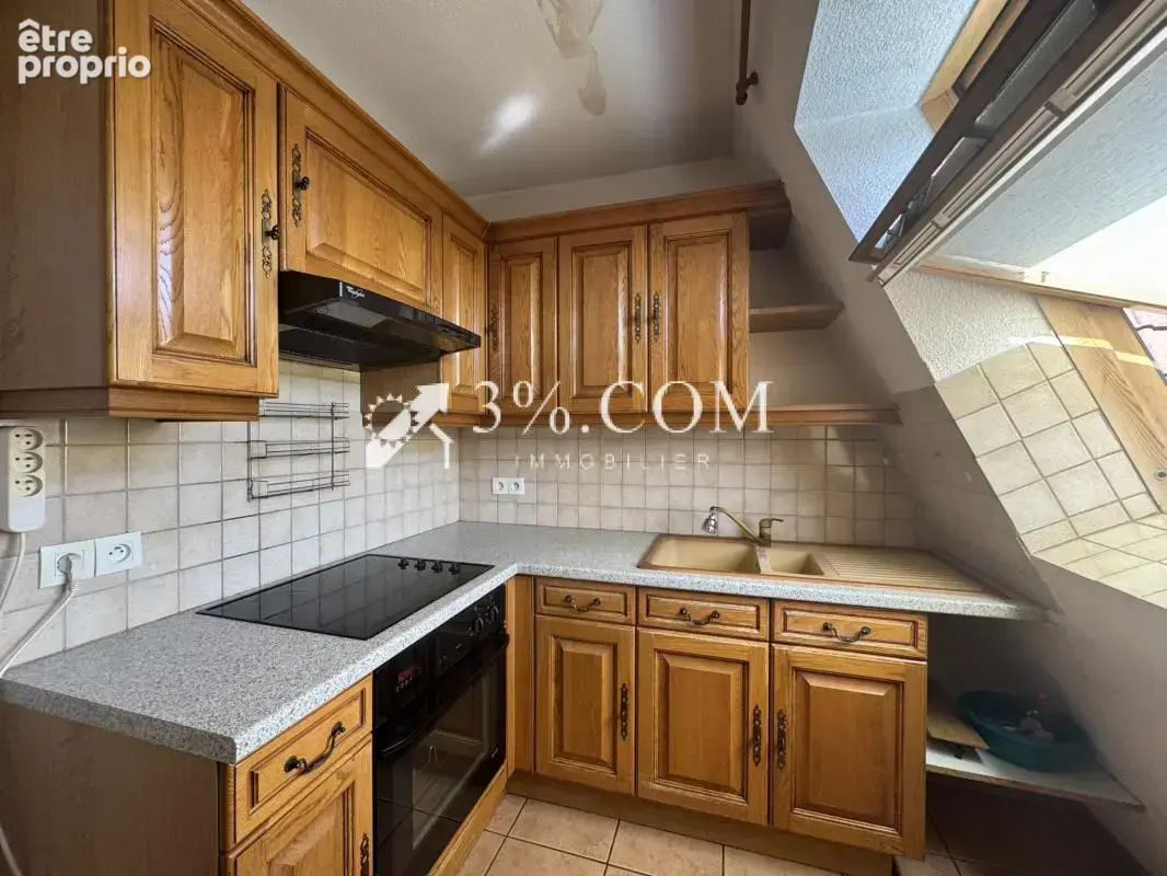 3%.COM - Joli  F2 au calme avec balcon, cave et garage - photo 8