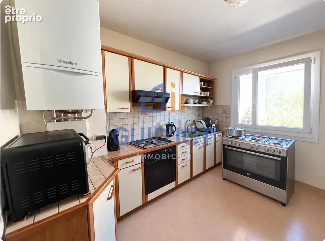 ONET-LE-CHÂTEAU   T4 traversant de 82 m2 avec balcon, garage et cave - photo 5
