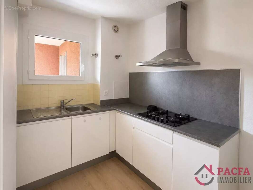 Appartement T2 avec terrasse et parking - photo 2