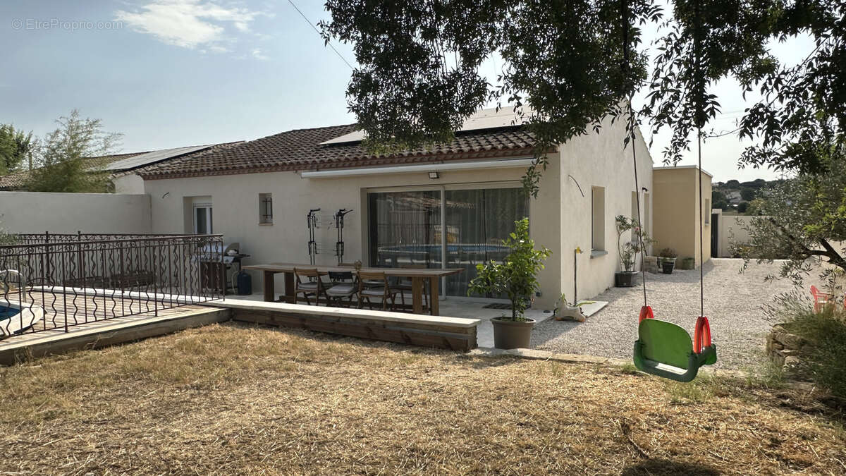 Villa F4 de 105m2 hab, garage, sur 518m2 de terrain à Saturargues - photo 2