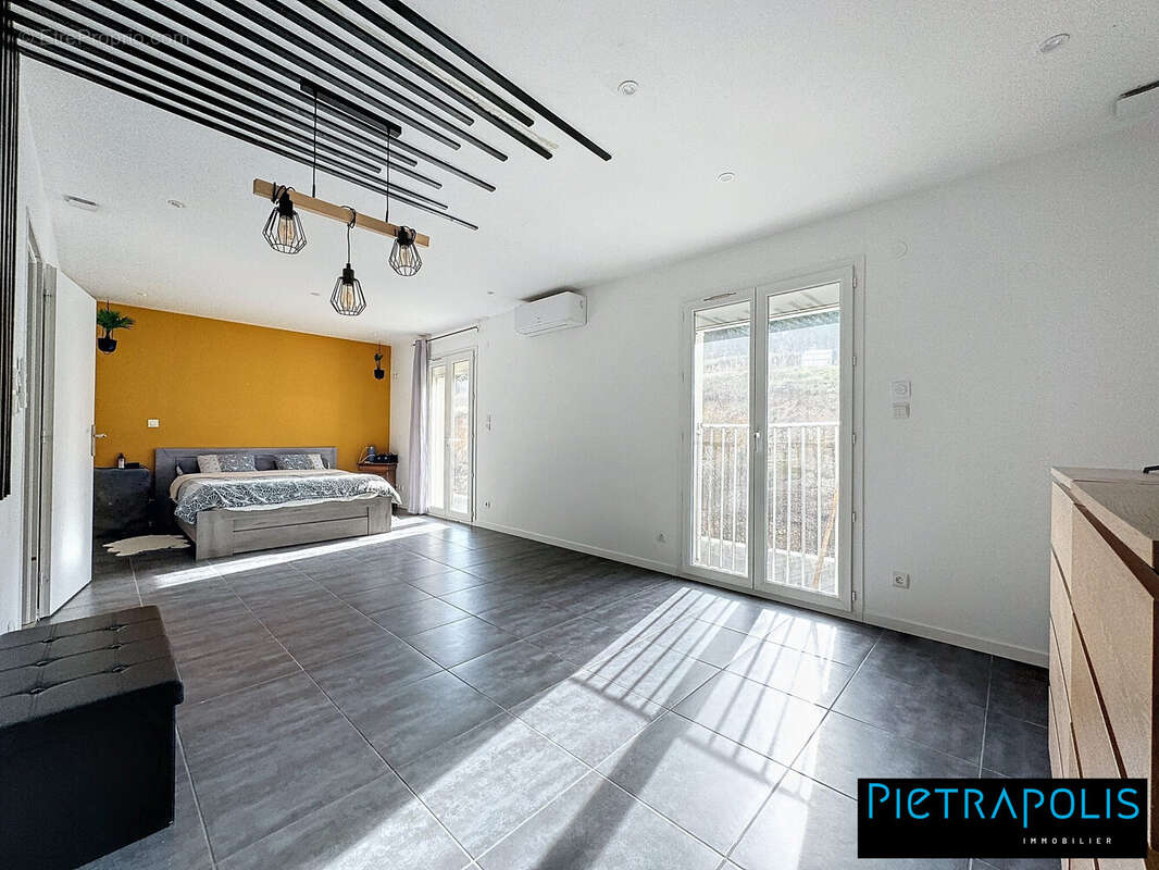 Maison à PONT-EVEQUE