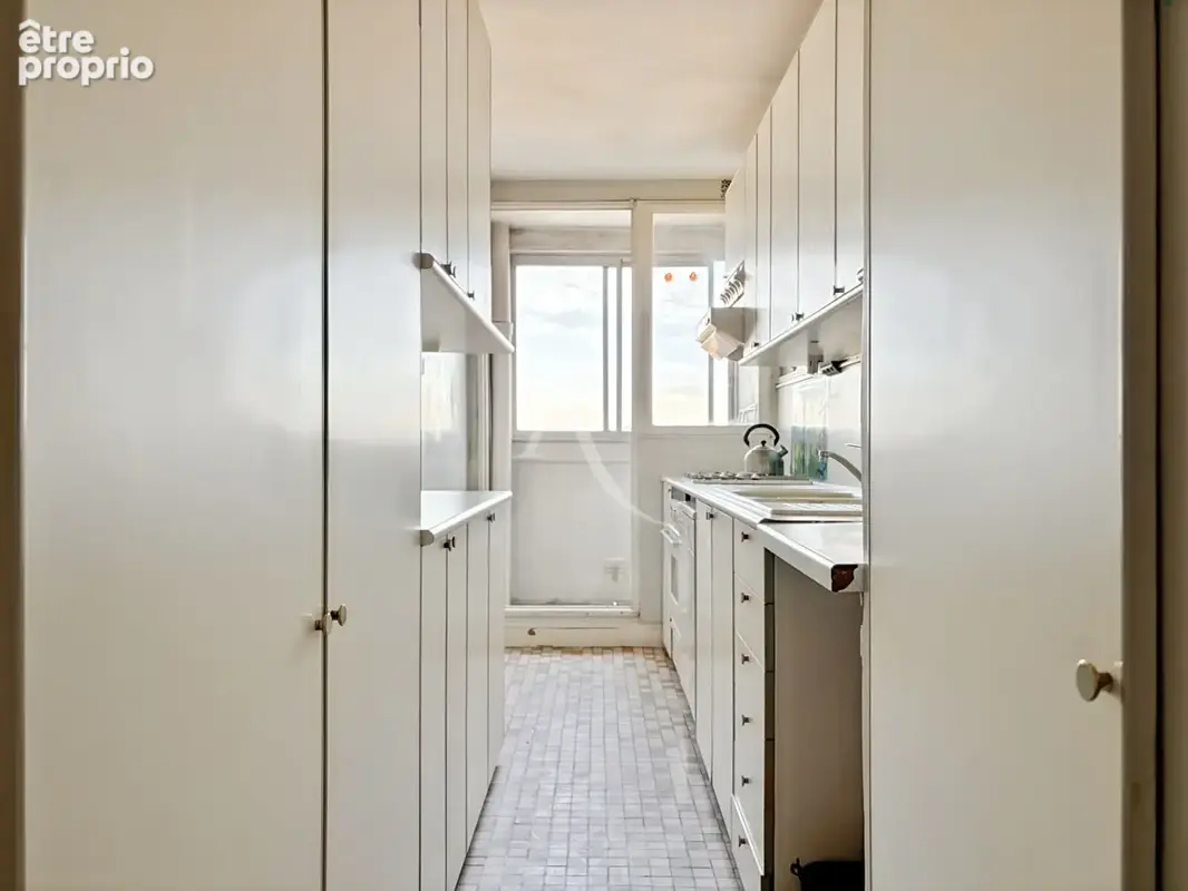 Boulogne  70 m²  3 pièces aux volumes rares  10e étage   vues dégagées - photo 8