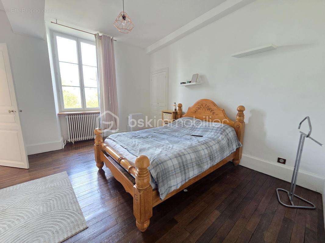 Magnifique appartement T3 de 101m² avec place de parking privative et cave en hypercentre ville de Nevers - photo 14