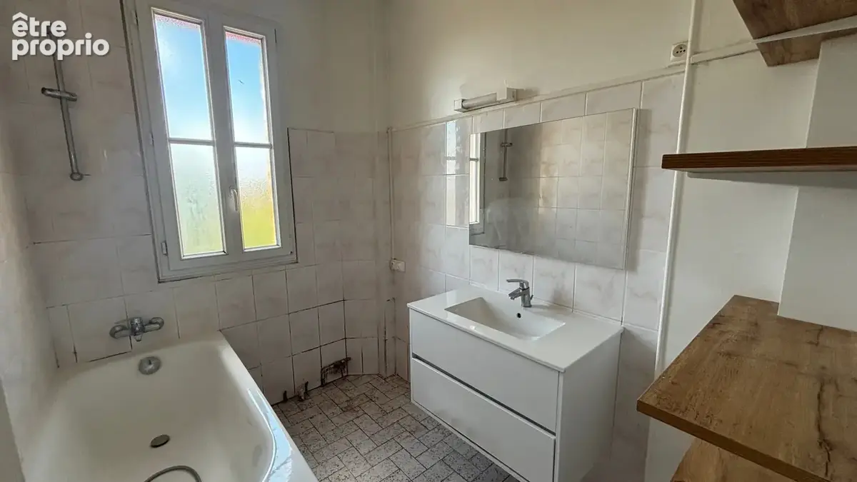 Appartement F3/4 - Quartier marché - photo 11