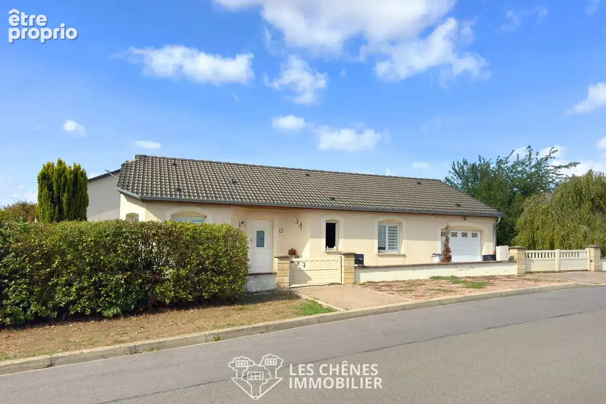Maison de plain-pied   90 m2   terrain de 6.81ares   garage - photo 1