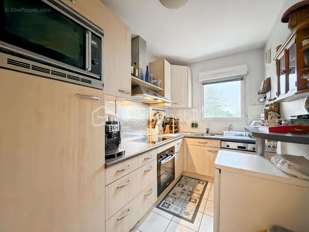 Appartement F4 - 75 m2 - 4 chambres - terrasse VUE SEINE - photo 5