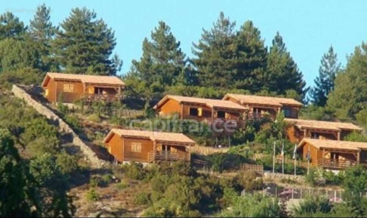 Dpt Corse (20), à vendre EVISA, propriété avec six chalets en bois, terrasse vue panoramique, piscine, parking - photo 6
