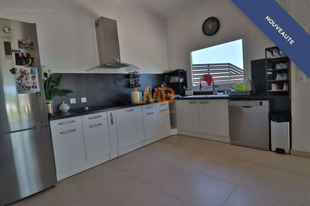 Double habitation T4 92 m2 + T2 85 m2 - photo 5