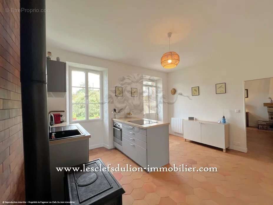 Longére et son verger avec dépendances - photo 10
