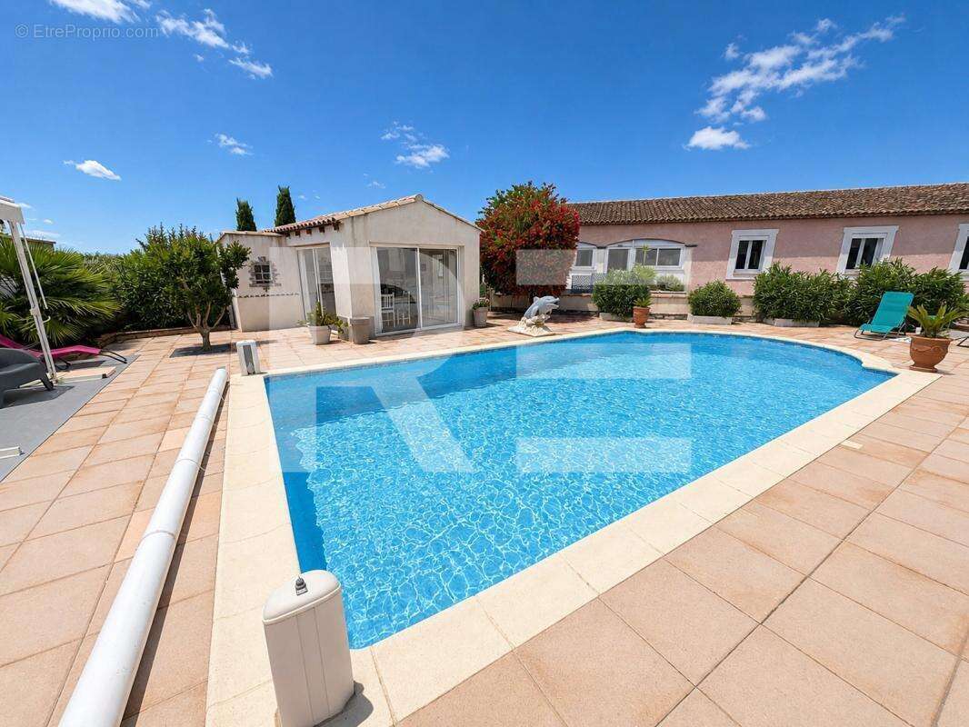 A vendre maison de plain-pied avec piscine sur beauvoisin - photo 2