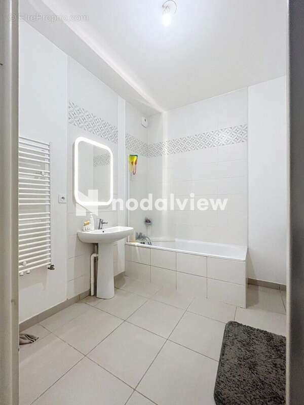 Photo 8 - Appartement à FLEURY-LES-AUBRAIS
