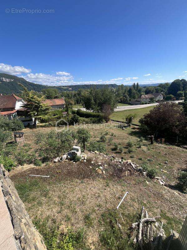 A vendre – terrain constructible viabilisé de 1 059 m² – murs-et-gélignieux (01300) - photo 3