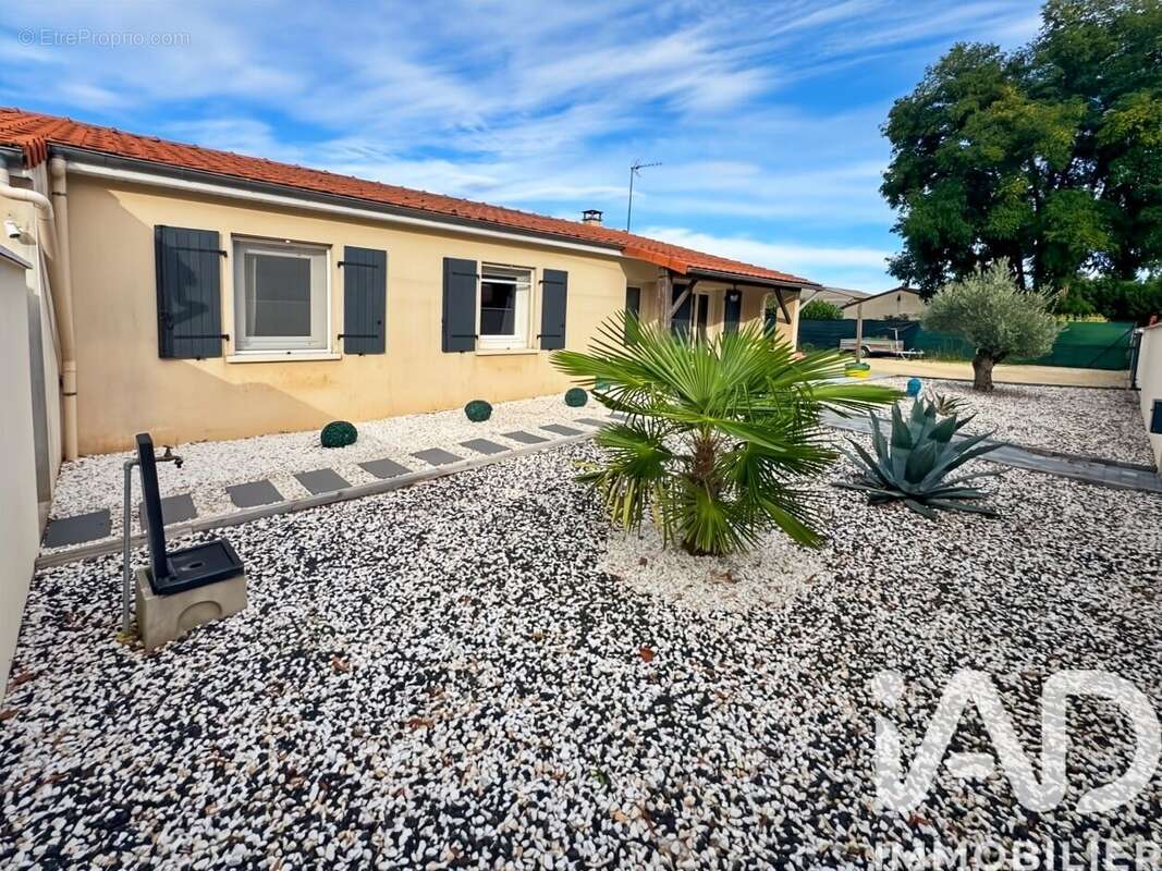 Photo 2 - Maison à VOUILLE