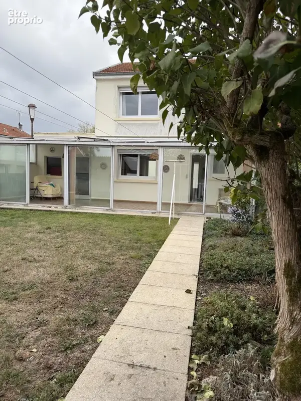Maison mitoyenne de 70 m2 avec jardin et garage - photo 2