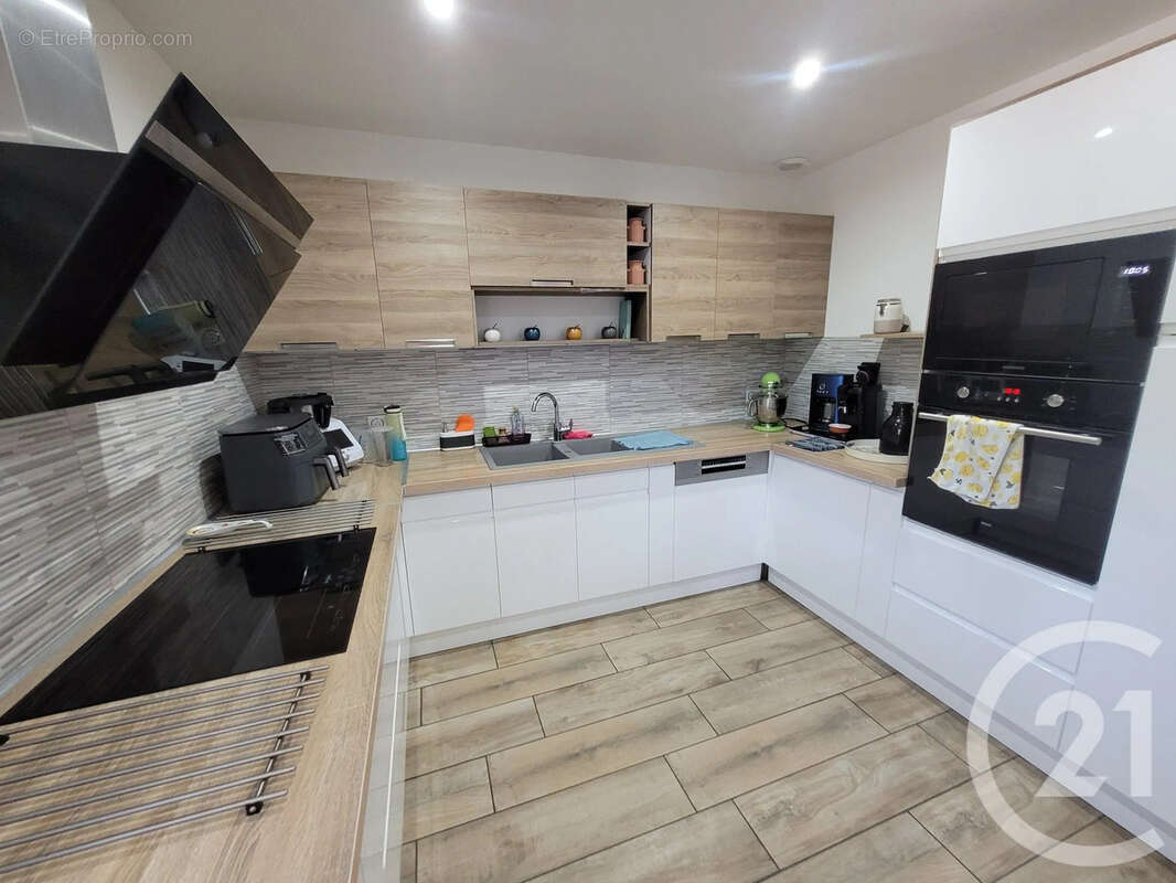Maison 125 m² à Montpont-En-Bresse  - photo 5
