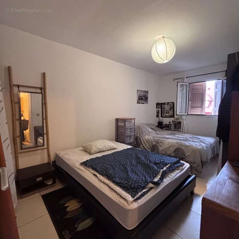 Appartement t3 montgaillard – saint-denis 97400 - photo 7