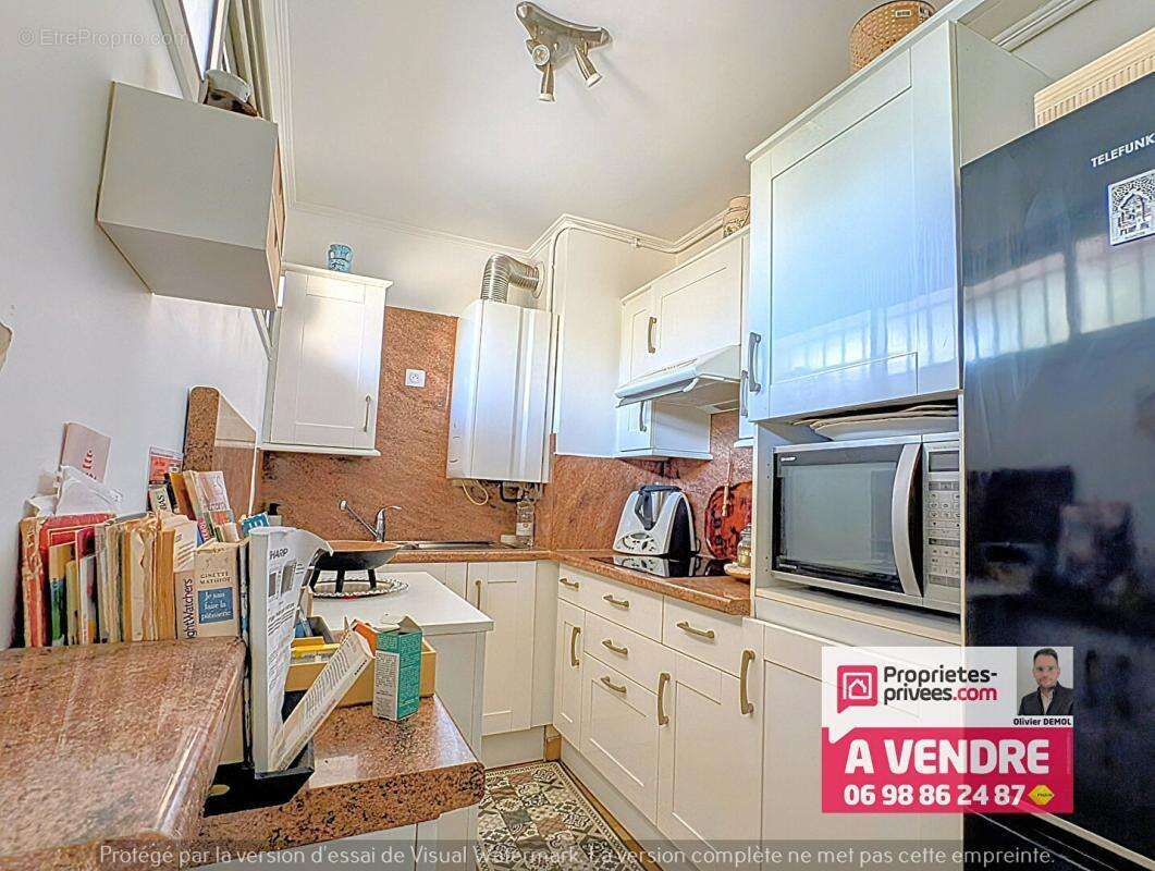 Beau 2 pieces 45 m² avec cave et parking - centre ville au calme - photo 7