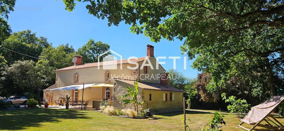 Photo 1 - Maison à AVRILLE