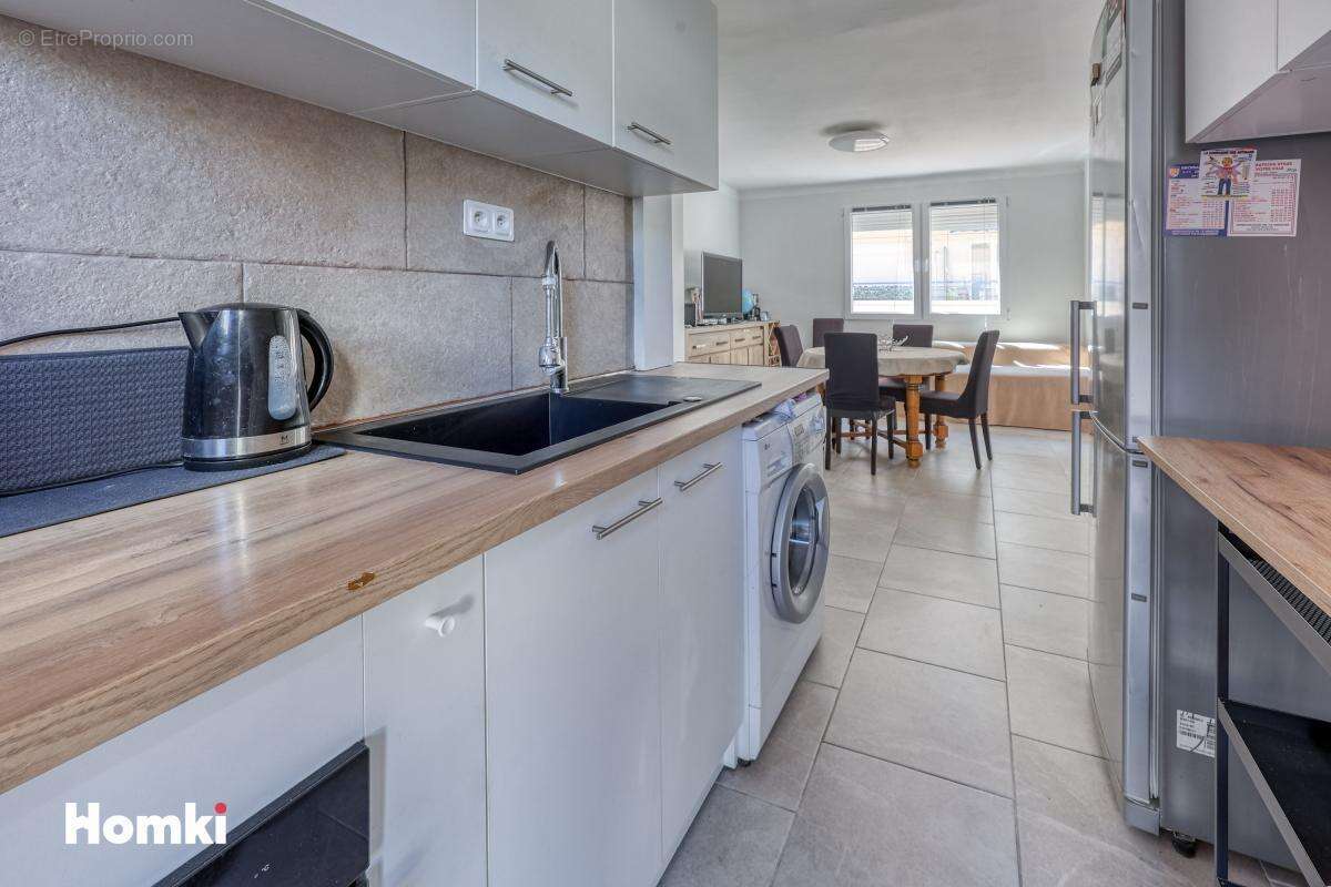 A vendre ! Appartement T3 traversant rénove avec balcon ascenseur et cellier ideal investissement ou résidence principale - photo 4