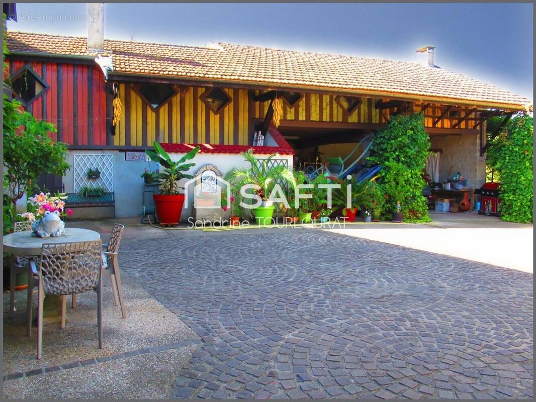 Photo 1 - Maison à SAINT-BAUDILLE-DE-LA-TOUR