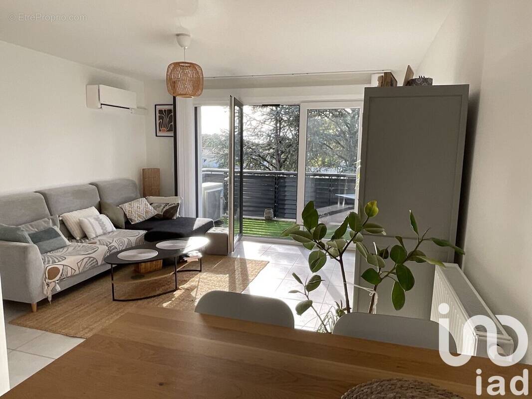 Photo 1 - Appartement à PAREMPUYRE