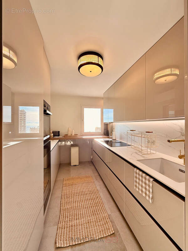 Appartement rénové avec des materiaux de luxe - garage et cave - photo 8