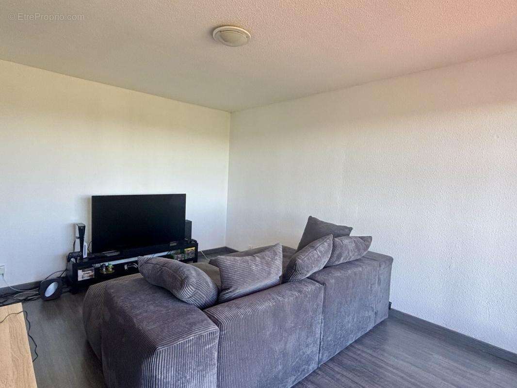 Appartement de T2 vendu loué avec balcon dans résidence avec ascenseur - photo 2