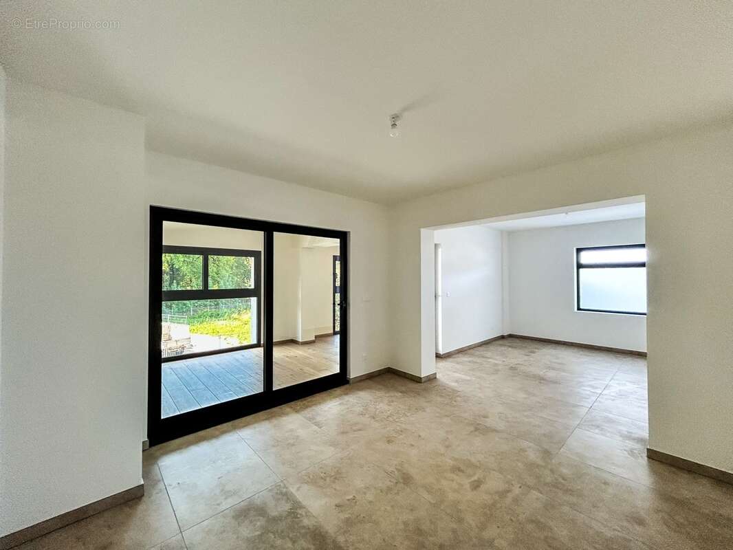 À vendre – Appartement T4 duplex traversant de charme dans une ancienne bâtisse rénovée à Viuz-en-Sallaz - photo 3