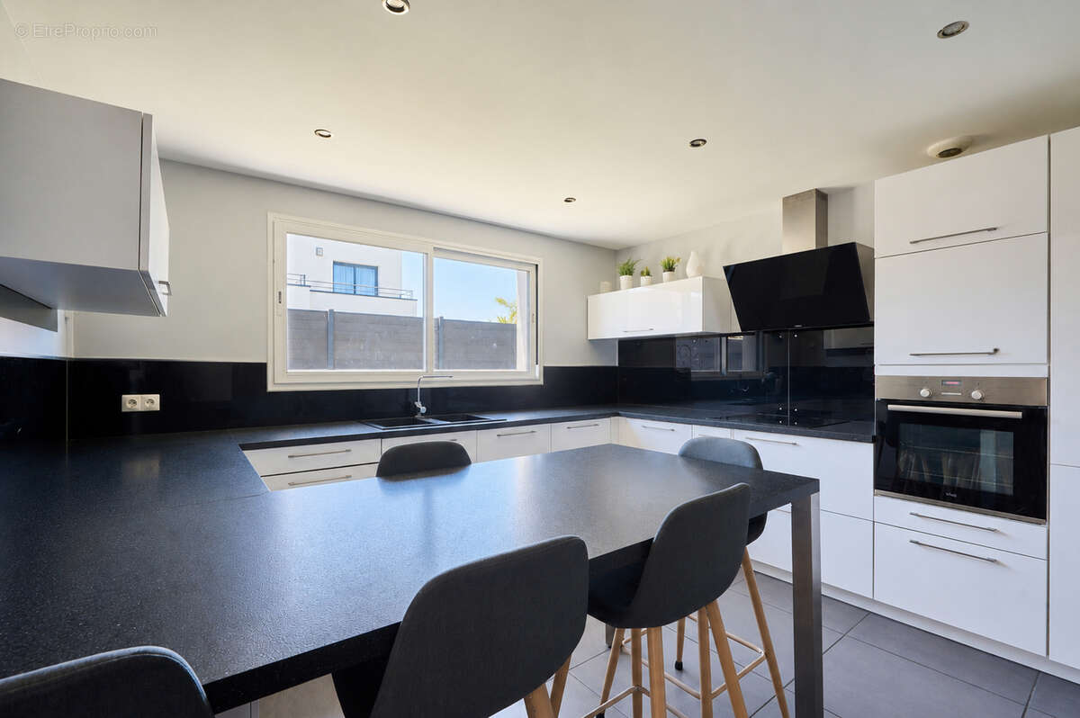 Maison contemporaine à CHEVIGNY-SAINT-SAUVEUR 7 PIÈCES 162m2 - photo 7