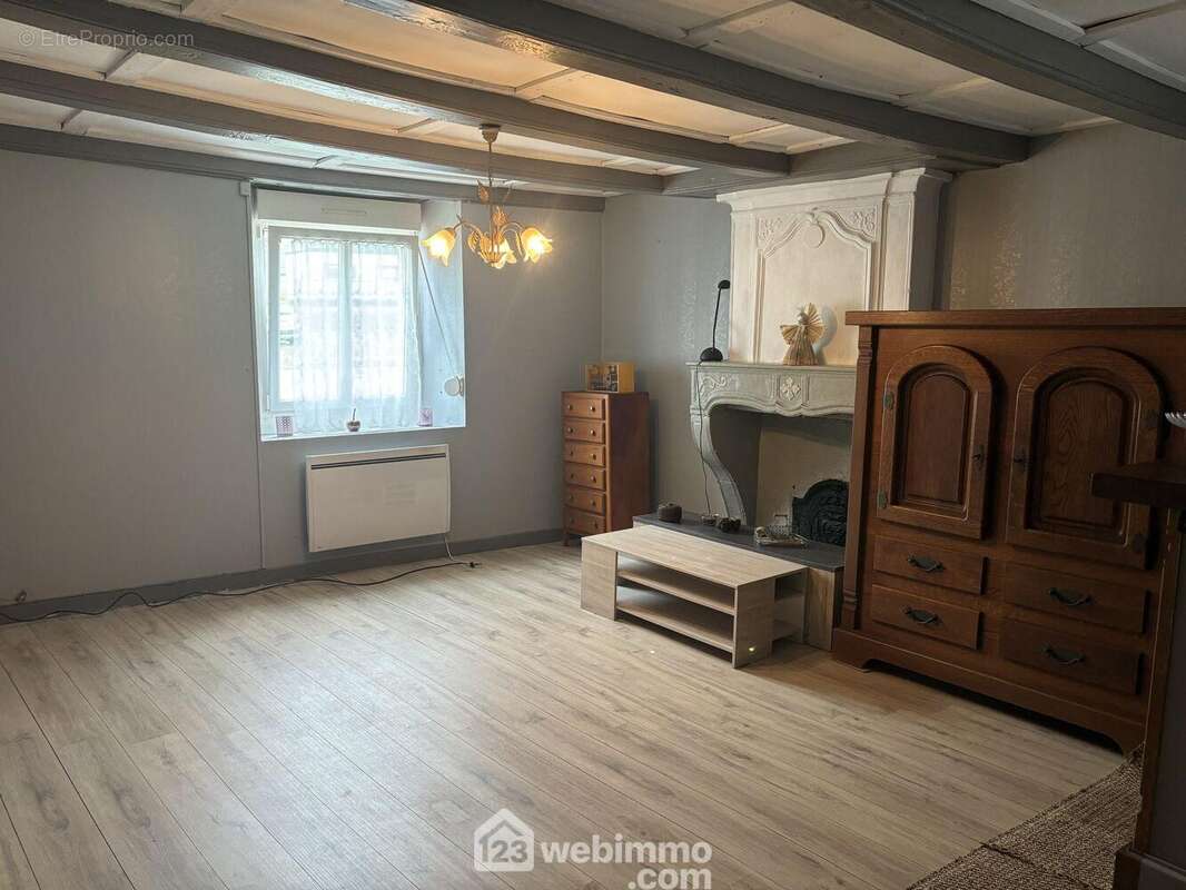 Maison à COUROUVRE