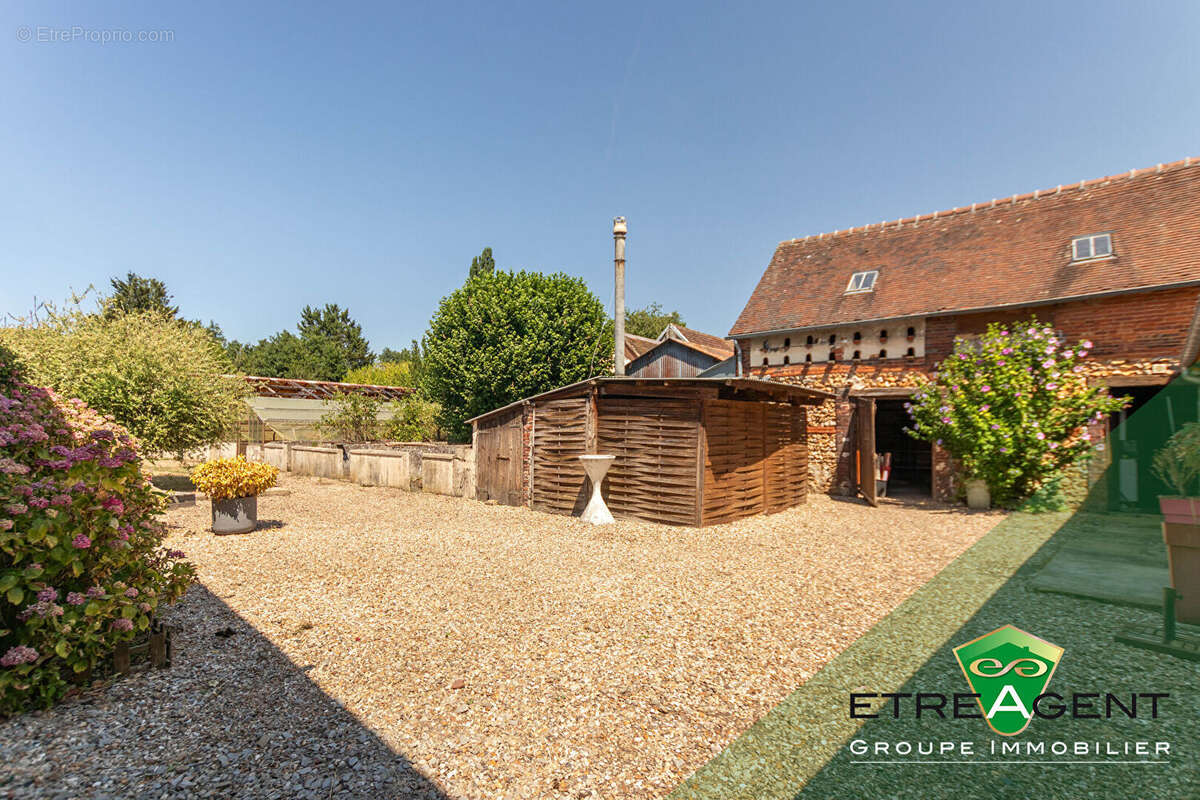 Maison DAMVILLE CENTRE-VILLE - 142 m² - 3 chambres - photo 3