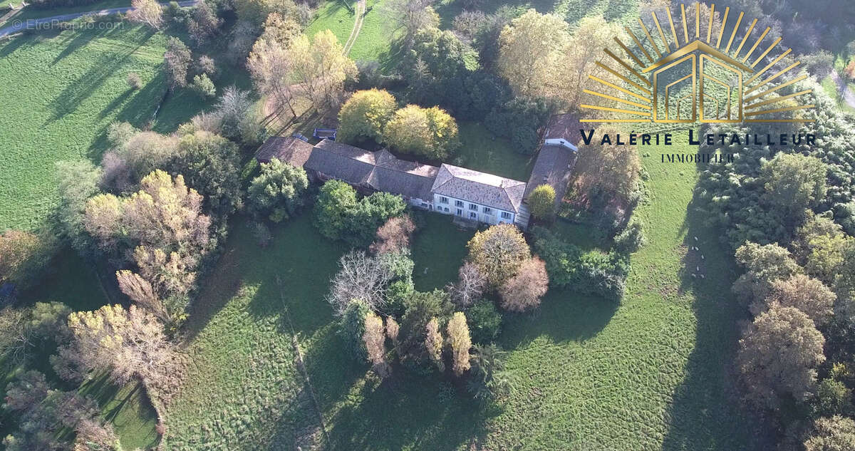 Domaine d'exception en pierre : Charme et Potentiel au Cœur de 4 Hectares de Verdure - photo 3