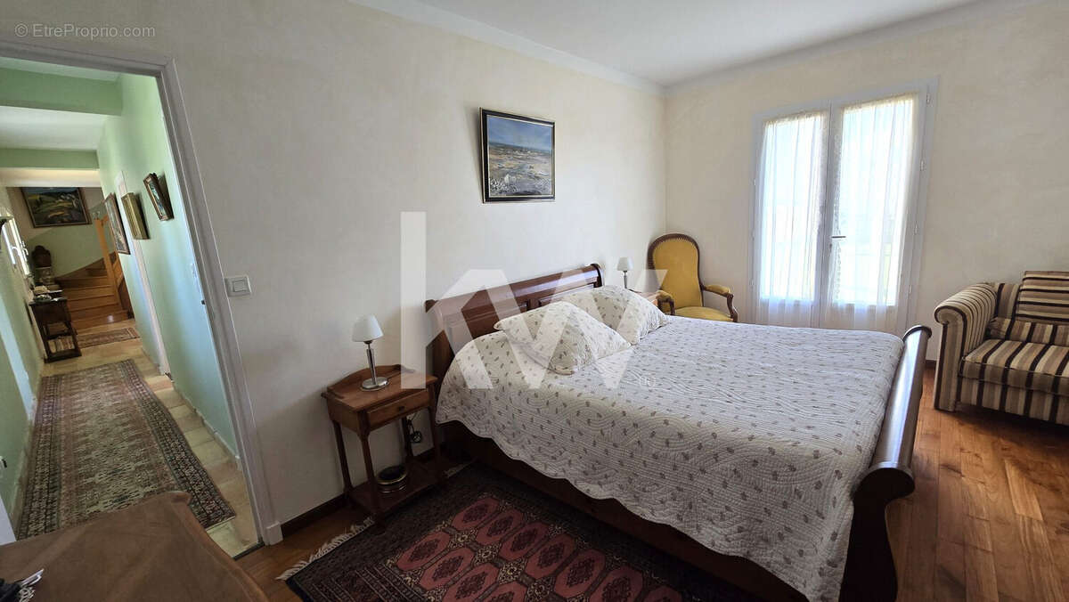 Chambre parentale au RDC