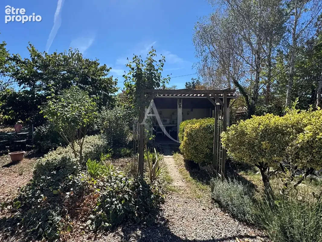 Maison L Isle Jourdain type T4 sur 3200 m² de terrain - photo 12