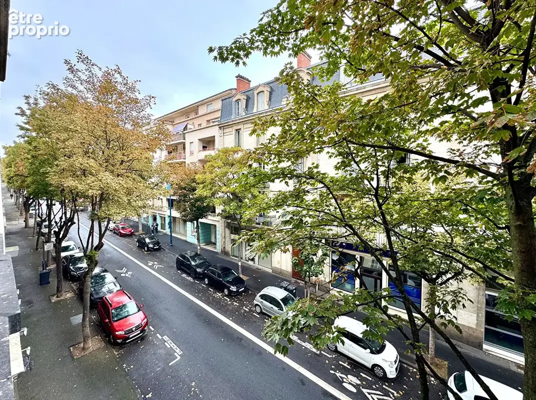 CLERMONT-FERRAND / Immeuble de caractère du XIXe, 84 M2 habitables et espaces chaleureux ! - photo 7